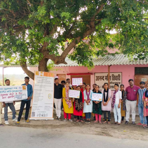 group of peopl showing flash cards